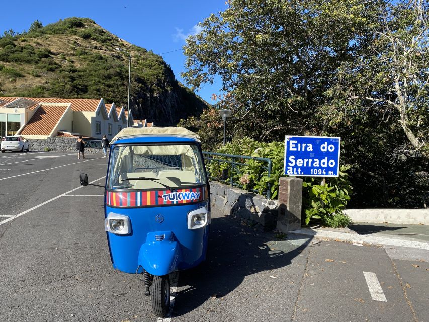 From Funchal: Madeira Nuns Valley Sightseeing Tuk-Tuk Tour - Funchal’s painted door and the first mountain views