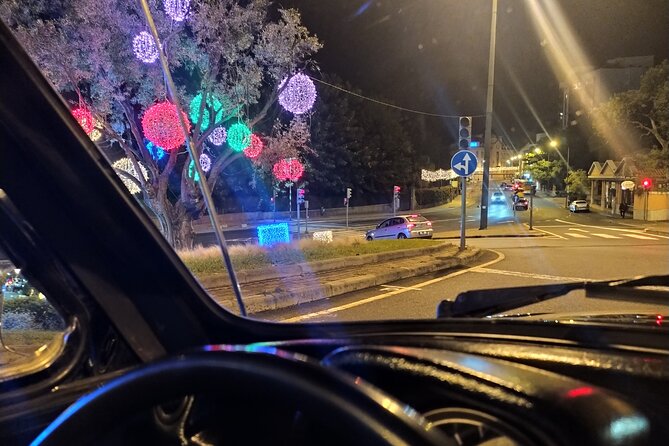 Funchal Christmas lights sightseeing night tour - Funchal at Christmas, seen from a classic car