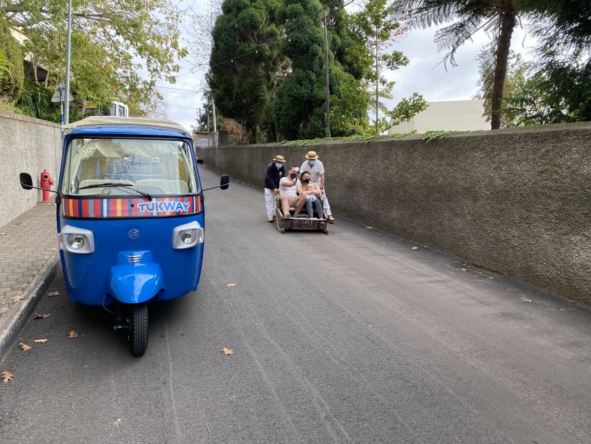 Funchal: Monte Tropical Garden & Toboggan Ride by Tuk Tuk - Monte Church and the mountain setting