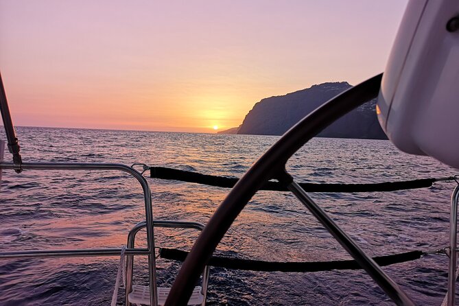 Madeira Private Sunset Boat Tour from Funchal - Funchal’s cliffs, hotels, and evening lights